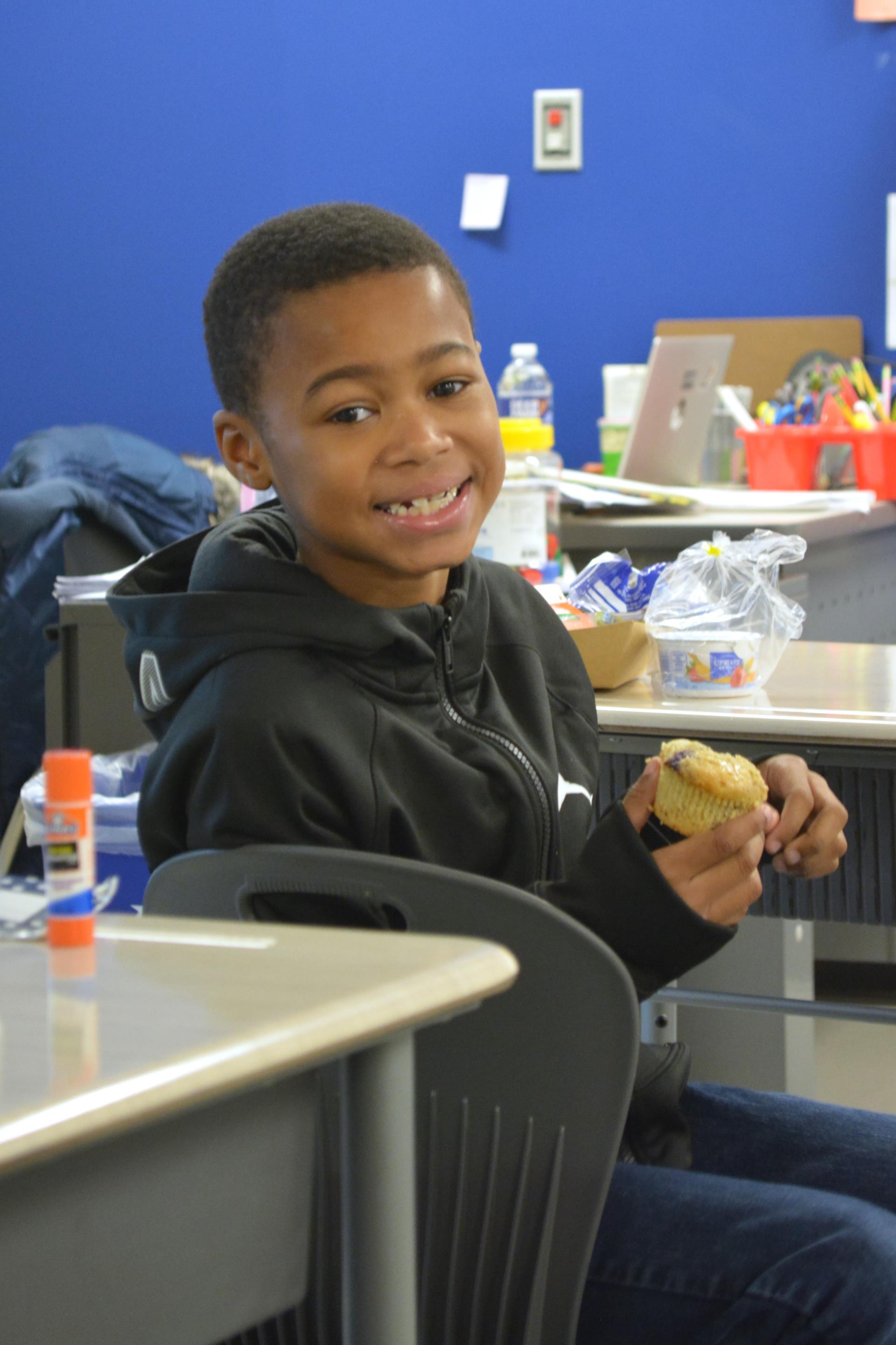 Student eating breakfast in the classroom